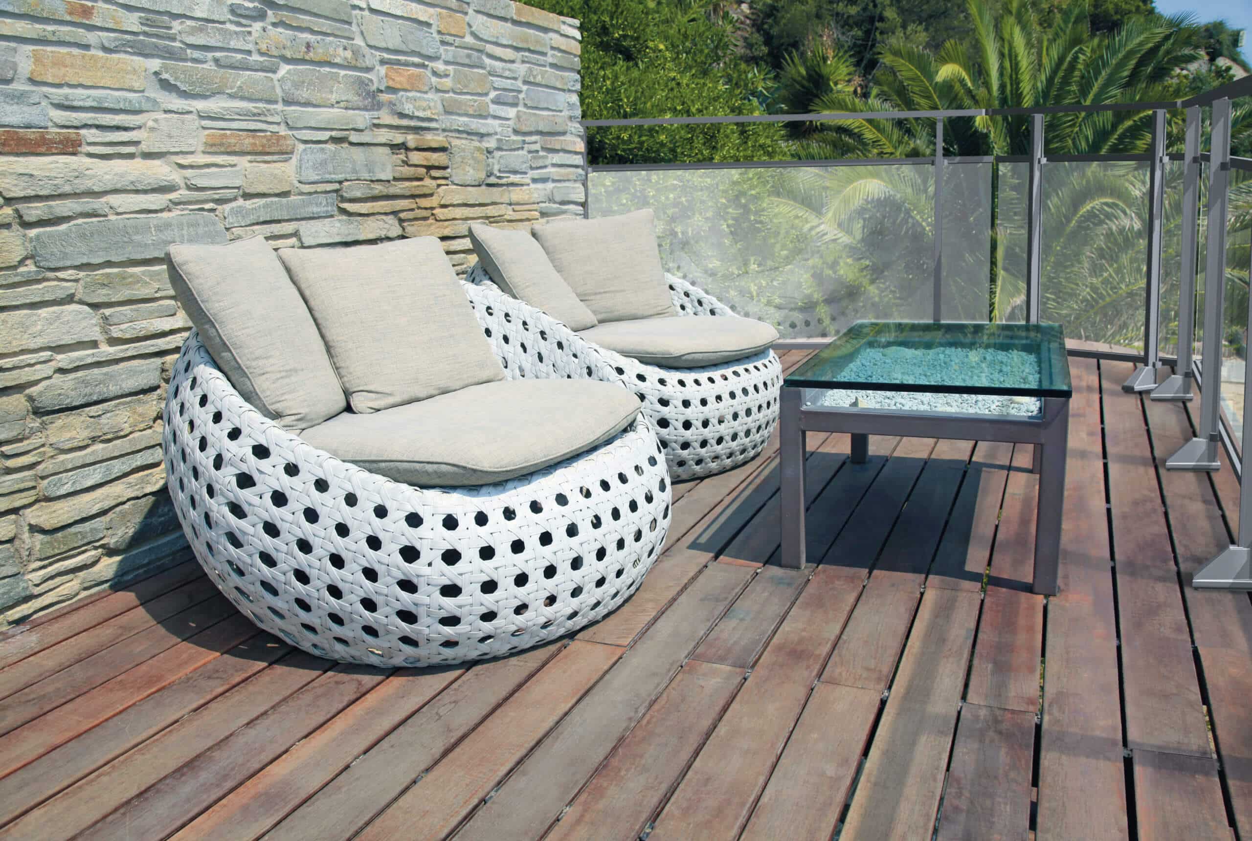 White outdoor furniture on wood resort terrace